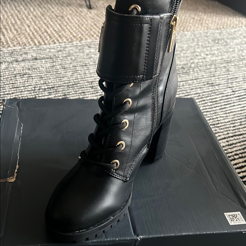 Tommy H. Black Lace-Up Ankle Boots